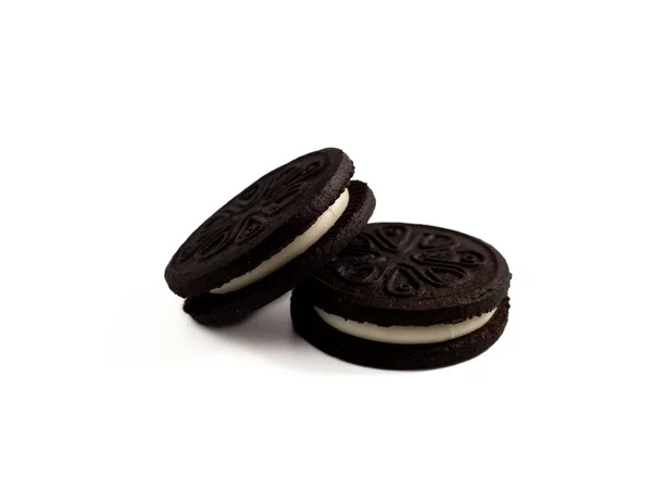 Černé Chutné Sušenky Izolované Bílém Pozadí Detailní Záběr — Stock fotografie
