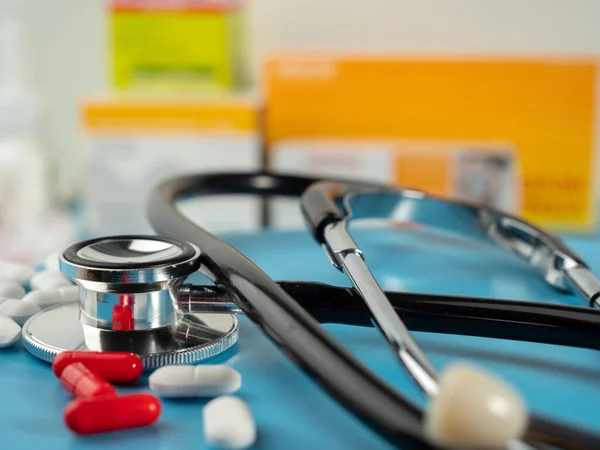 Stock image Medicines and a stethoscope. Capsules and tablets. Close-up.