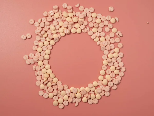 stock image Pink pills on a pink background. Medical tablets. Pills close-up.