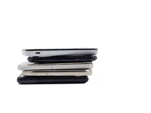 Skadade Mobiltelefoner Ett Gäng Trasiga Smartphones Använda Telefoner Ljus Bakgrund — Stockfoto