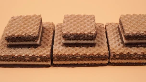Delicious Chocolate Waffles Hazelnuts Orange Background Wafers Chocolate Nuts Camera — Stock Video