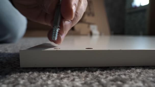 Master Assembles Furniture Using Electric Screwdriver Man Installing Furniture — Stock Video