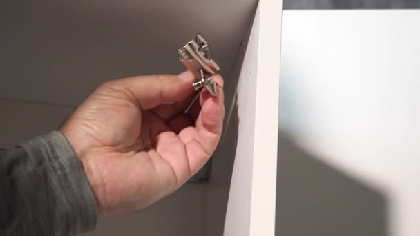 Installing Hinges Furniture Door Using Electric Screwdriver Man Assembling Furniture — Stock Video