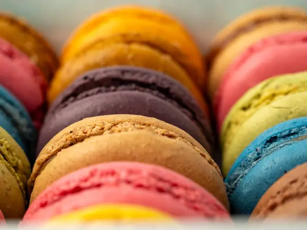 Packaging of Colorful French Macaroons. French macaroons close-up.