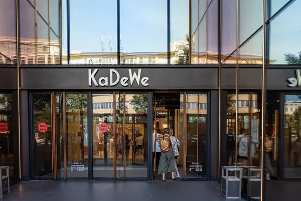 stock image Germany Berlin August 7, 2024. A sign with the name of the KaDeWe store above the entrance to the building. A supermarket sign.