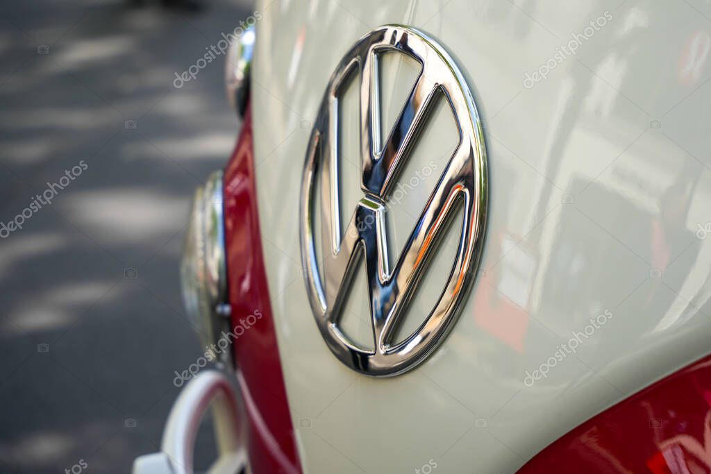 Germany Berlin May 11, 2025. VW Bulli Emblem side view. Close-up of the VW logo from an oblique perspective. The shiny surface reflects its surroundings, making the legendary Bulli a real eye-catcher.