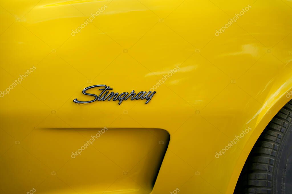Germany Berlin May 11, 2025. Stingray lettering on yellow paint. The iconic Stingray lettering stands out brilliantly against the bright yellow paint. A clear symbol of sporting power and automotive history.