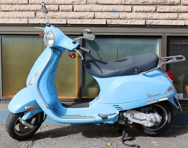 stock image QUEBEC MONTREAL - 10 19 2022 Colorfull Vespa is an Italian brand of scooter manufactured by Piaggio. The name means wasp in Italian.