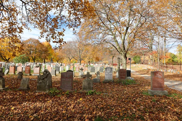 stock image MONTREAL CANADA - 10 19 2022: Monuments in Notre-Dame-des-Neiges Cemetery during sunny day in fall. Is the largest cemetery in Canada and the third-largest in North America