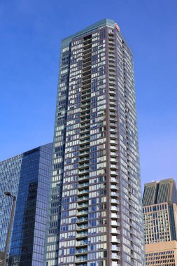 MONTREAL QUEBEC CANADA - 12 13 2022: The Tour des Canadian ens 1,2 ve 3 Montreal, Quebec, Kanada 'da bulunan bir gökdelen kompleksi. Montreal şehir merkezindeki Bell Center 'ın yanında yer almaktadır.