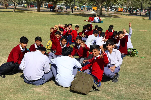 stock image DELHI INDIA - 02 11 2023: Unidentified local school boys in park of the India gate