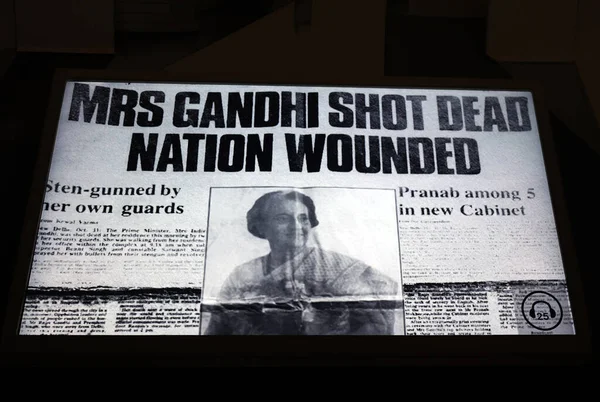 stock image Newspaper with Indira Gandhi on black background