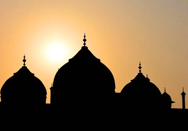 stock image TAJ MAHAL UTTAR PRADESH INDIA - 03 01 2023: View of the Taj Mahal at sunrise is an ivory-white marble mausoleum on the right bank of the river Yamuna in Agra