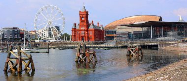 CARDIFF WALES UNITED KINGDOM 06 17 2023: Cardiff Bay is the area created by the Cardiff Barrage in South Cardiff, the capital of Wales. The Welsh National Assembly is located there. clipart