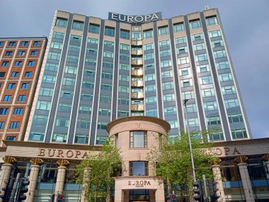 BELFAST NORTHERN IRELAND UNITED KINGDOM 06 03 23: Europa Hotel was constructed by Grand Metropolitan and designed by Sydney Kaye. During The Troubles was known as Europes most bombed hotel (36 bombs) clipart