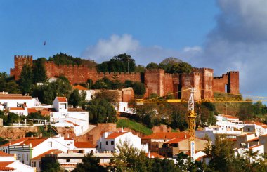 MONSARAZ PORTUGAL 10 21 2002: The Castle of Monsaraz (Castelo de Monsaraz) is a picturesque castle perched on the highest point in the walled village of Monsaraz in the Alto Alentejo region. clipart