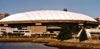 VANCOUVER BC CANADA 12 29 2002: BC Place is a stadium located at the north side of False Creek, in Vancouver, British Columbia, Canada. It is owned and operated by the BC Pavilion Corporation clipart