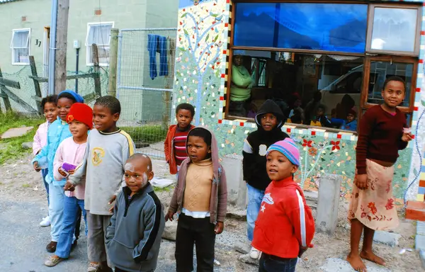 stock image KHAYELITSHA, CAPE TOWN SOUTH AFRICA 05 22 2007: young children on a street of Khayelitsha township in Western Cape reputed to be the largest and fastest growing in SA.