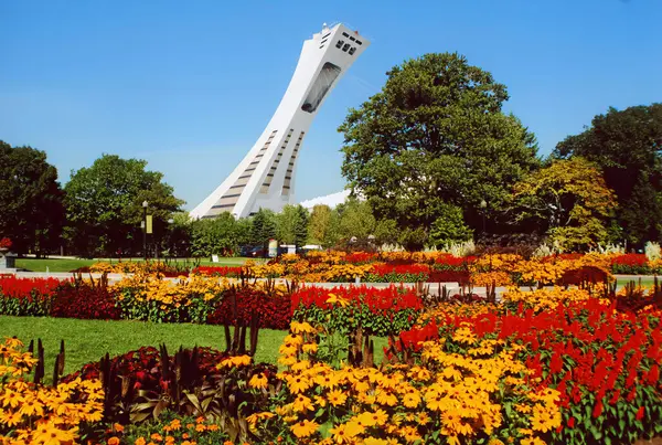 stock image MONTREAL CANADA 08 09 2007 : Montreal botanical garden is considered to be one of the most important botanical gardens in the world in background the olympic stadium tower