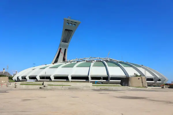 stock image MONTREAL QUEBEC CANADA 09 03 2024: The Montreal Olympic Stadium and tower. It's the tallest inclined tower in the world.Tour Olympique stands 175 meters tall and at a 45-degree angle