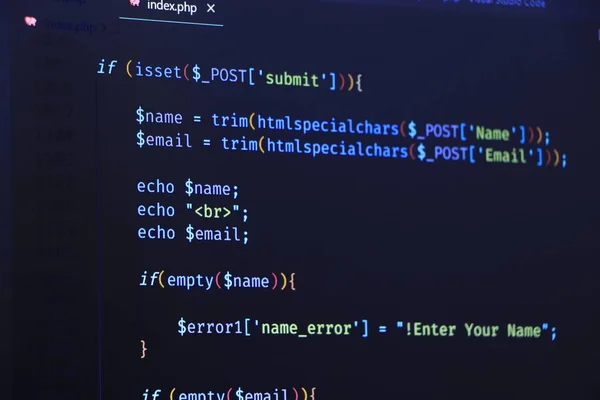 AngularJS in editor for website development. Coding script text on screen.