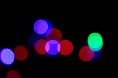 Şehirdeki Bokeh ışıklarının soyut görüntüsü.