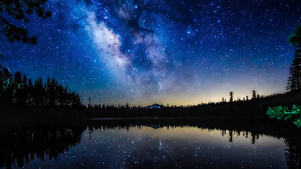 stock image Starry Night Under Lake and Trees. High quality photo