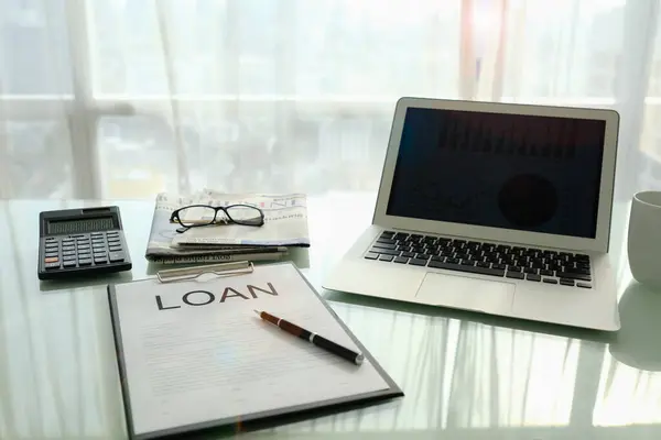 Loan agreement document on desk of bank loan officer. concept of business loan.