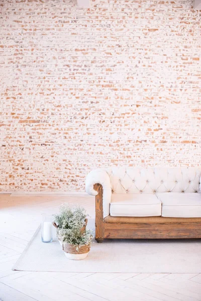 Home Interior White Quilted Sofa Wooden Base Front Blank Brick — Stock Photo, Image