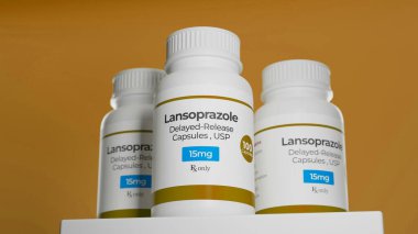 Lansoparazole 15 mg 'lık şişe içinde. Proton pompası inhibitörü PPI. 3d oluşturma