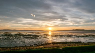 Denizde gün doğumu