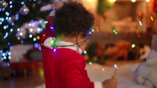 African American Little Boy Playing Garland Unrecognizable Man Taking Decoration — Stock Video