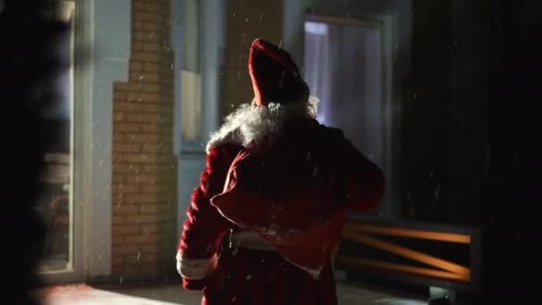 Back View Confident Man Santa Claus Costume Walking Outdoors Snowy — Stock Video