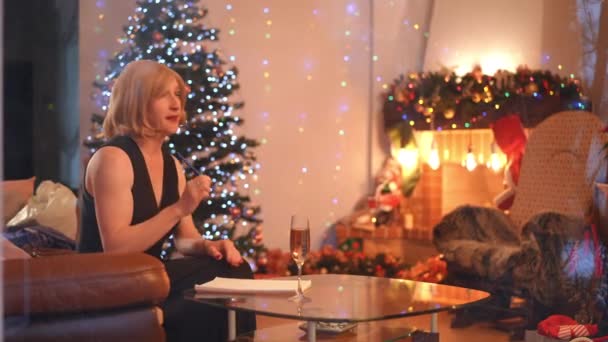 Thoughtful Gender Fluid Person Writing Letter Santa Claus Sitting Left — Stock Video