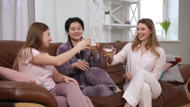 Three Relaxed Happy Young Women Pajamas Talking Sitting Coffee Cups — Stock Video