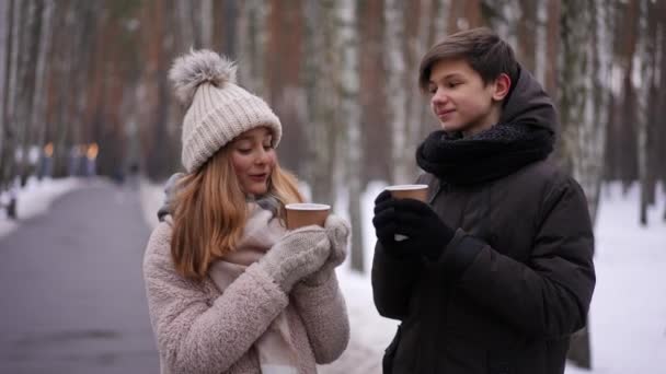 Smiling Relaxed Teen Couple Standing Hot Tea Cups Park Alley — Stock Video