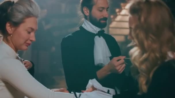 Young Professional Skilled Men Women Helping Each Other Putting Costumes — Vídeo de stock
