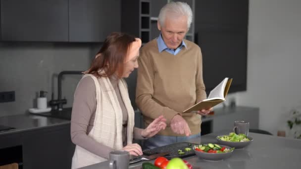 Positive Senior Man Reading Recipe Talking Woman Gathering Ingredients Vegan — Stock video