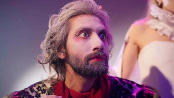 Astonished Caucasian Man Theatrical Makeup Looking Away Surprised Facial Expression — Vídeo de Stock