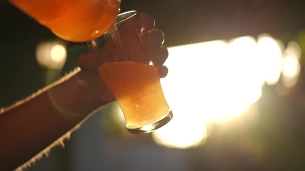 Close Pouring Light Lager Beer Glass Slow Motion Outdoors Unrecognizable — Vídeos de Stock