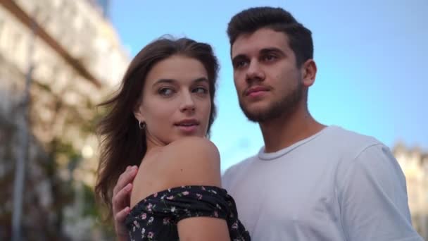 Confident Millennial Couple Looking Away Standing City Street Background Blue — Stock video
