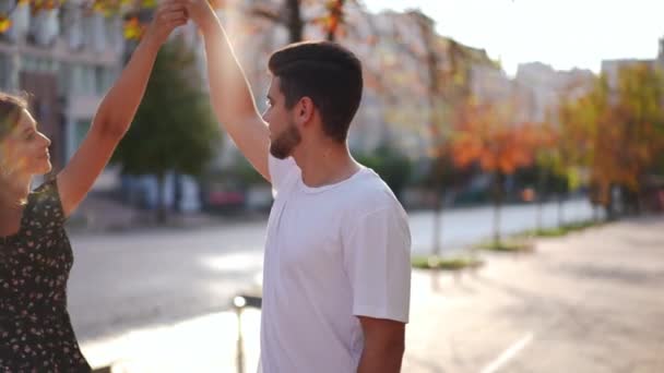 Smiling Loving Caucasian Woman Spinning Slow Motion Sunrays Holding Hands — Stockvideo