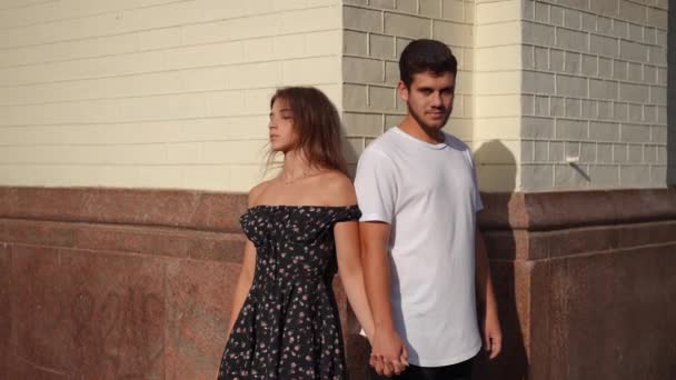 Romantic Loving Couple Leaning Urban City Wall Holding Hands Looking — Video Stock