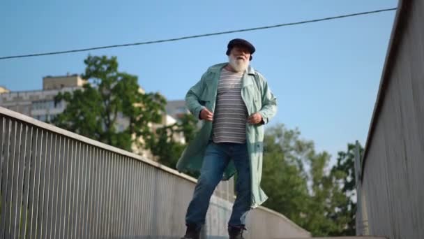 Bottom Angle View Cheerful Senior Man Spinning Having Fun Pedestrian — Stockvideo