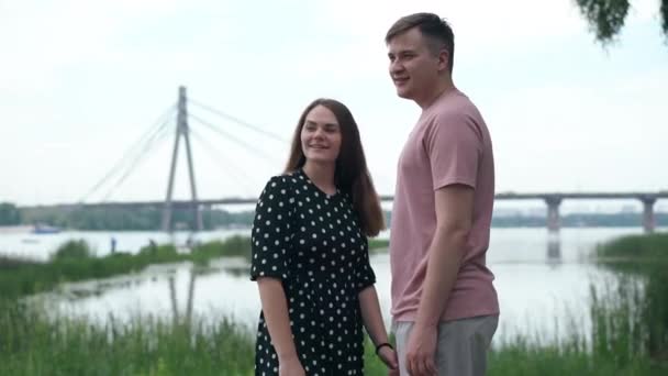 Medium Shot Portrait Loving Happy Young Couple Looking Away Talking — Video