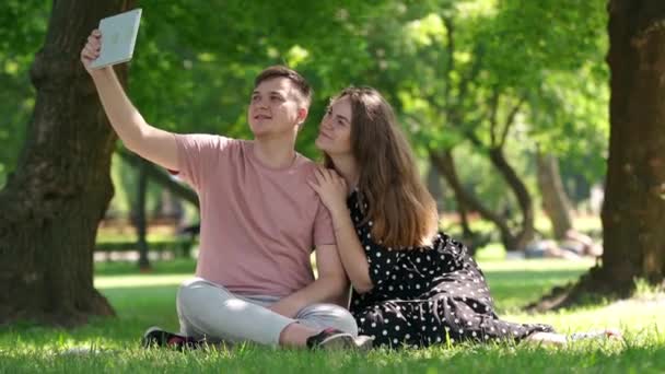 Wide Shot Smiling Gen Couple Taking Selfie Digital Tablet Application — Video