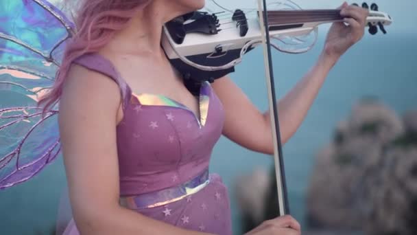 Unrecognizable Woman Fairy Costume Wings Playing Violin Slow Motion Outdoors — Stock Video