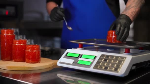 Unrecognizable Man Measuring Weight Red Caviar Jar Kitchen Scales Indoors — Stock Video