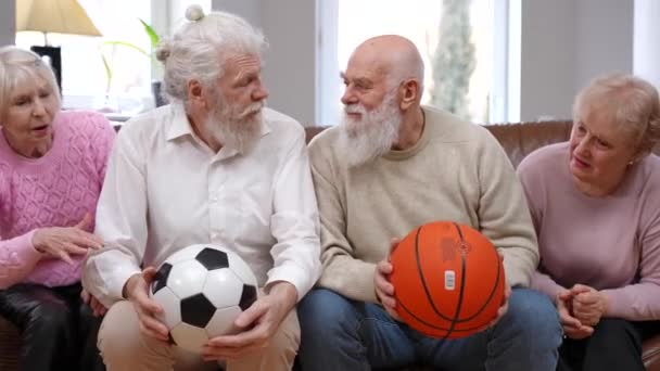 Senior Wives Supporting Husbands Talking Advantages Disadvantages Basketball Football Positive — Stock Video