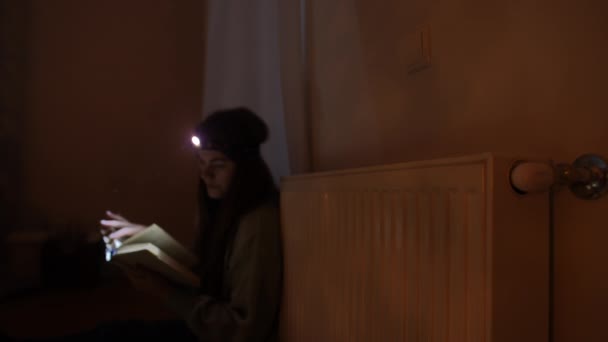 Blurred Caucasian Young Woman Headlamp Flashlight Reading Book Darkness Sitting — Stock Video